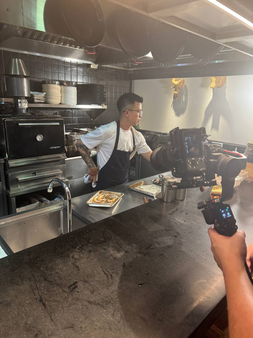 Filming a chef at work in the kitchen with a gimbal-mounted camera